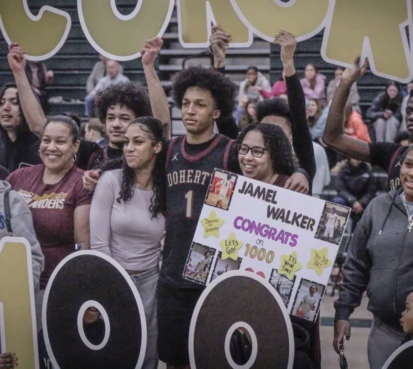 Jamel Walker celebrating his 1,000 point win with his friends and family.