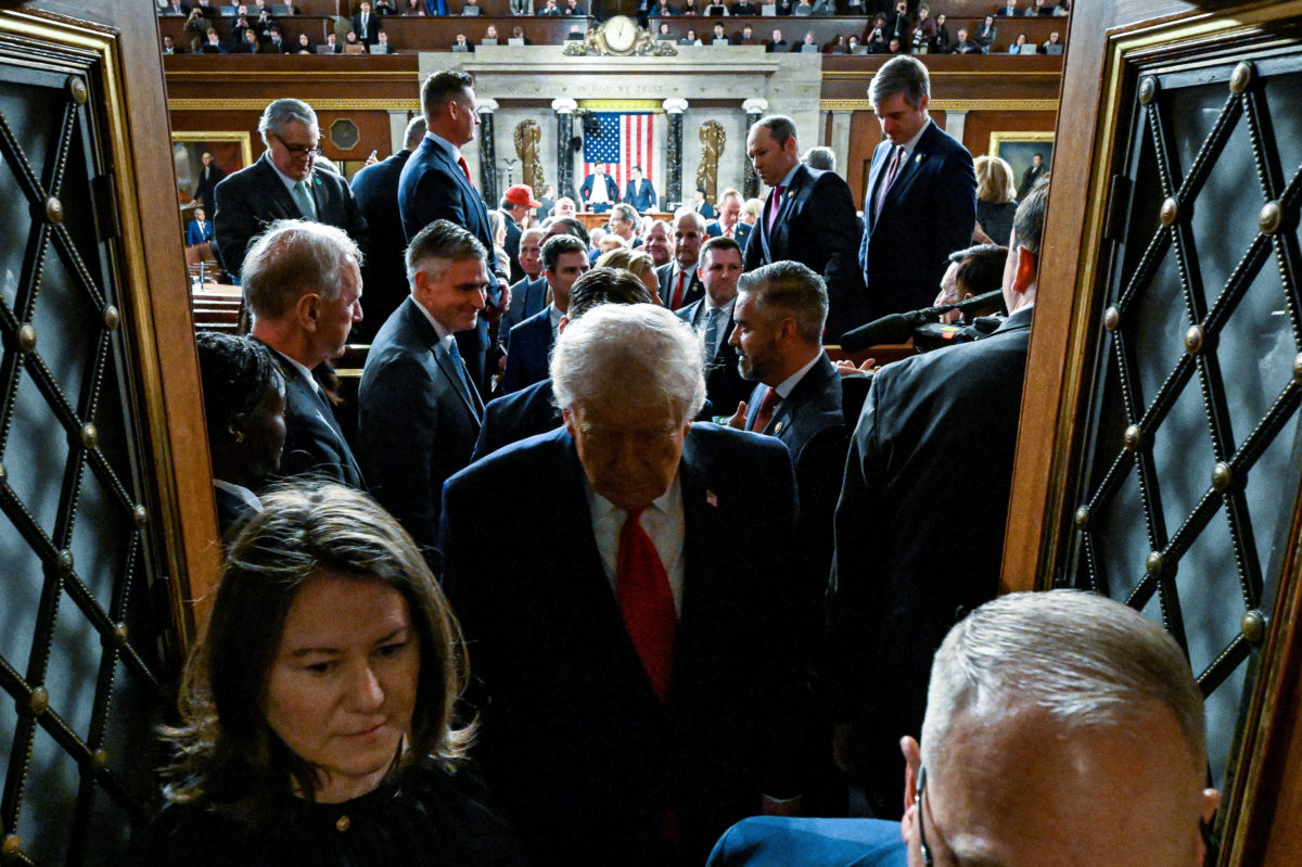 U.S. President Donald J. Trump exits the House Chamber after delivering the first State of the Union address of his second term to a joint session of Congress in the House Chamber of the United States Capitol in Washington, D.C., on Tuesday, February 24, 2026.  Kenny Holston/Pool via REUTERS  